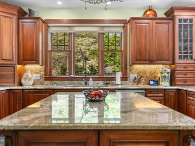 Experience exceptional lakefront living with 100 feet of - photo 39