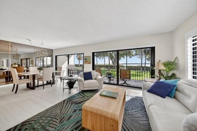 Riverfront Condo with Beach Access - Fully Updated & Move-In - photo 1