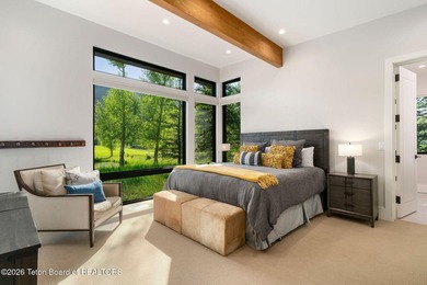 Nestled within the exclusive Snake River Sporting Club community - photo 11