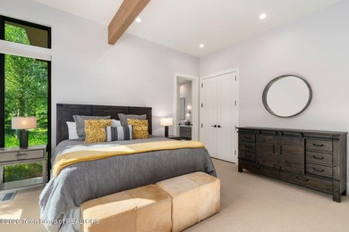 Nestled within the exclusive Snake River Sporting Club community - photo 12