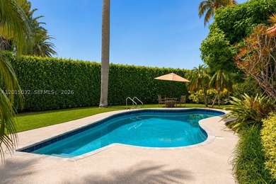 Located on prestigious South Hibiscus Drive, this exceptional - photo 1