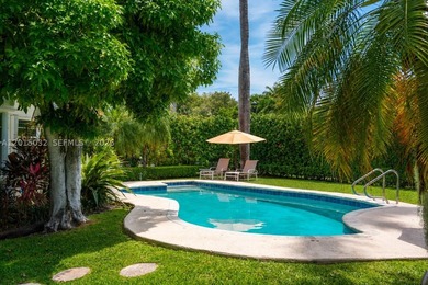 Located on prestigious South Hibiscus Drive, this exceptional - photo 2