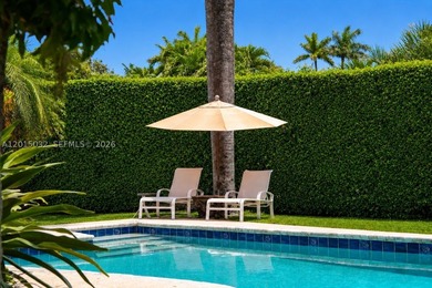 Located on prestigious South Hibiscus Drive, this exceptional - photo 5