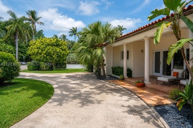Located on prestigious South Hibiscus Drive, this exceptional - photo 6