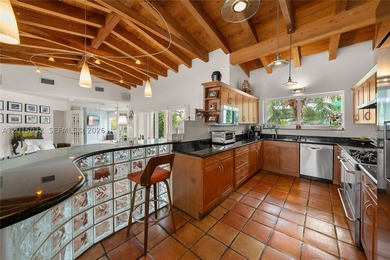 Located on prestigious South Hibiscus Drive, this exceptional - photo 10