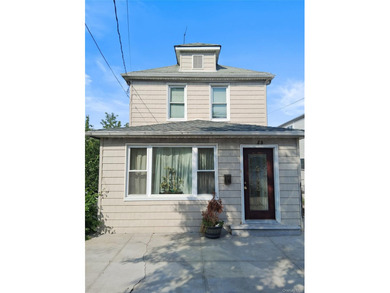 This two-bedroom, one-bathroom home in East Bronx sits within - photo 1