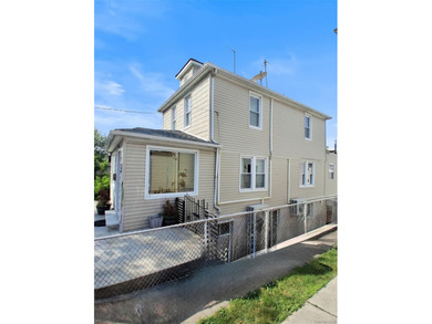 This two-bedroom, one-bathroom home in East Bronx sits within - photo 2