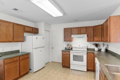 Welcome to this 3-bedroom, 2-bath single level home in the - photo 7