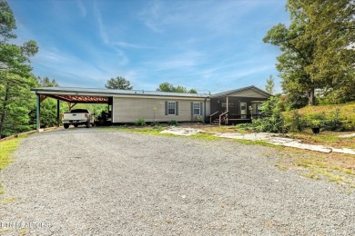 Lake Home For Sale in Ten Mile, Tennessee