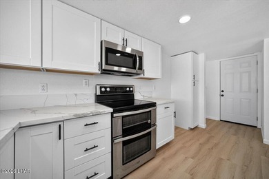 Just remodeled and move-in ready! This beautifully updated pool - photo 16