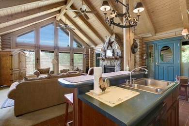 Log cabin situated on 4 acres featuring 2 bedrooms and 2.5 - photo 6