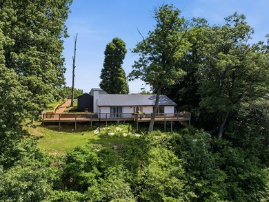 Wake up to breathtaking panoramic views of Herrington Lake from - photo 1