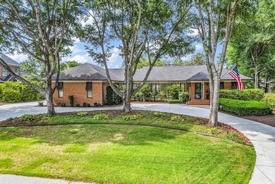 Experience true coastal living in the prestigious Dunes Golf & - photo 1