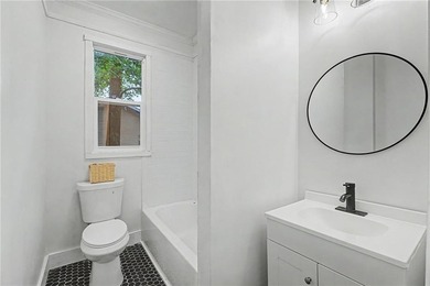Welcome to 812 E. 33rd Street, a beautifully updated bungalow - photo 15