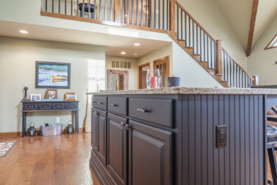 Custom Home on 3 WF lots, 2 DOCKS, Large Shop & Garage! - photo 8