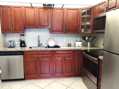 Lake Condo Sale Pending in Coconut Creek, Florida