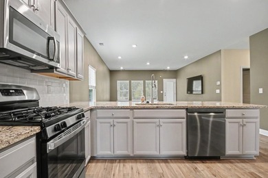 Welcome to this spacious 5-bedroom, 3.5-bath Kensington floor - photo 10