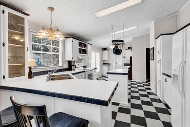Welcome to easy living in the sought-after 55+ community of - photo 8
