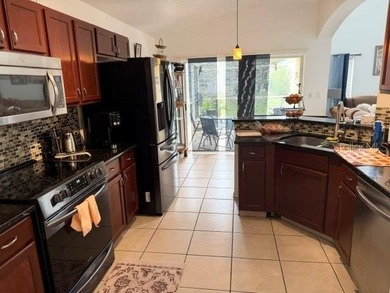 Fantastic 5 Bedrooms / 3 Full Baths Home with Private heated - photo 6