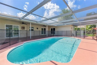 Welcome to this beautifully updated waterfront pool home in the - photo 1