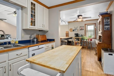 This property includes both a 4 BR, 2 BA home and a renowned & - photo 8