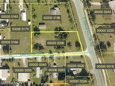 Charming Corner Lot in Bokeelia Nestled in the serene and - photo 1