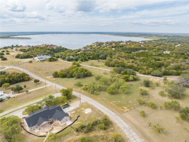 Own a piece of paradise right inside the private gated community - Lake Lot For Sale in Whitney, Texas