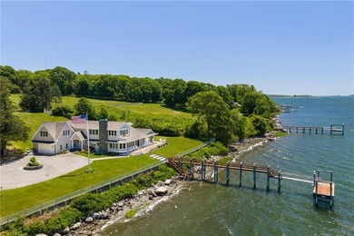 Set along the edge of the Sakonnet River in Tiverton, this - photo 1