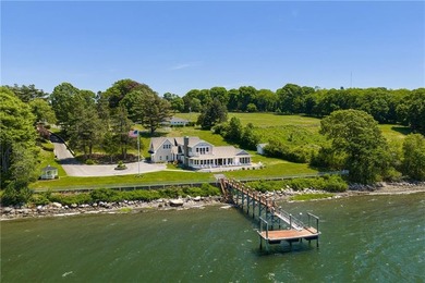 Set along the edge of the Sakonnet River in Tiverton, this - photo 2