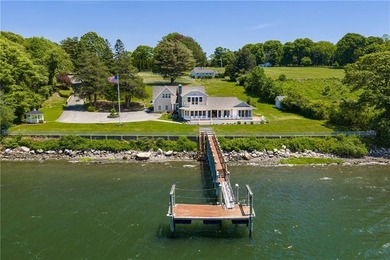Set along the edge of the Sakonnet River in Tiverton, this - photo 3