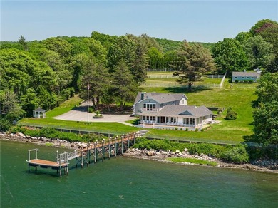 Set along the edge of the Sakonnet River in Tiverton, this - photo 4