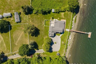 Set along the edge of the Sakonnet River in Tiverton, this - photo 8