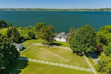 Set along the edge of the Sakonnet River in Tiverton, this - photo 10