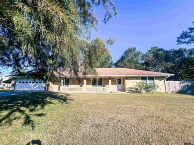 This charming 3-bedroom, 2-bath brick home located just outside - photo 1