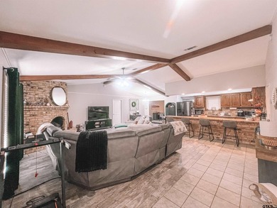 This charming 3-bedroom, 2-bath brick home located just outside - photo 3