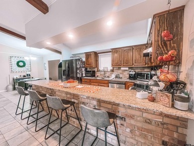 This charming 3-bedroom, 2-bath brick home located just outside - photo 7