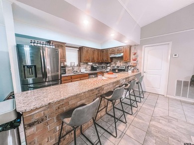This charming 3-bedroom, 2-bath brick home located just outside - photo 9
