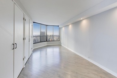 GREAT VIEWS, REDONE WOOD FLOORS, REMODELED KITCHEN, AND A HIGHLY