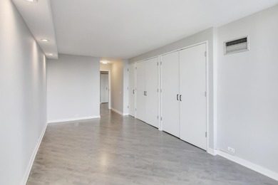 GREAT VIEWS, REDONE WOOD FLOORS, REMODELED KITCHEN, AND A HIGHLY