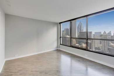 GREAT VIEWS, REDONE WOOD FLOORS, REMODELED KITCHEN, AND A HIGHLY