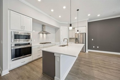 Experience coastal living at its finest in this like new