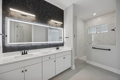 Experience coastal living at its finest in this like new