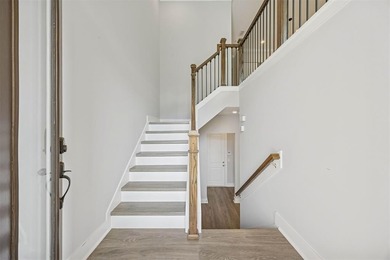 Experience coastal living at its finest in this like new