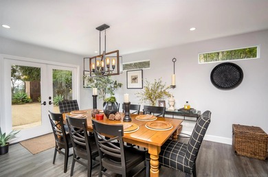Discover this beautifully remodeled Mediterranean-style home at - photo 9
