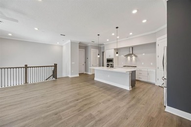 Experience coastal living at its finest in this like new