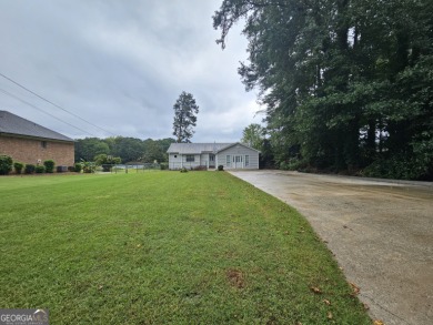 Lake Home For Sale in Stockbridge, Georgia