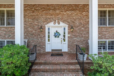 All Brick Colonial style house with almost 2 acres and 3100+