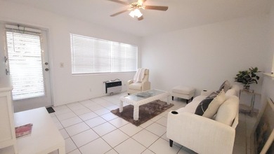 REDUCED TO SELL! Discover easy coastal living in this charming - photo 2