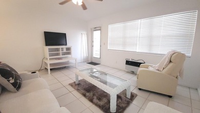 REDUCED TO SELL! Discover easy coastal living in this charming - photo 3