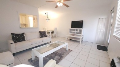 REDUCED TO SELL! Discover easy coastal living in this charming - photo 4